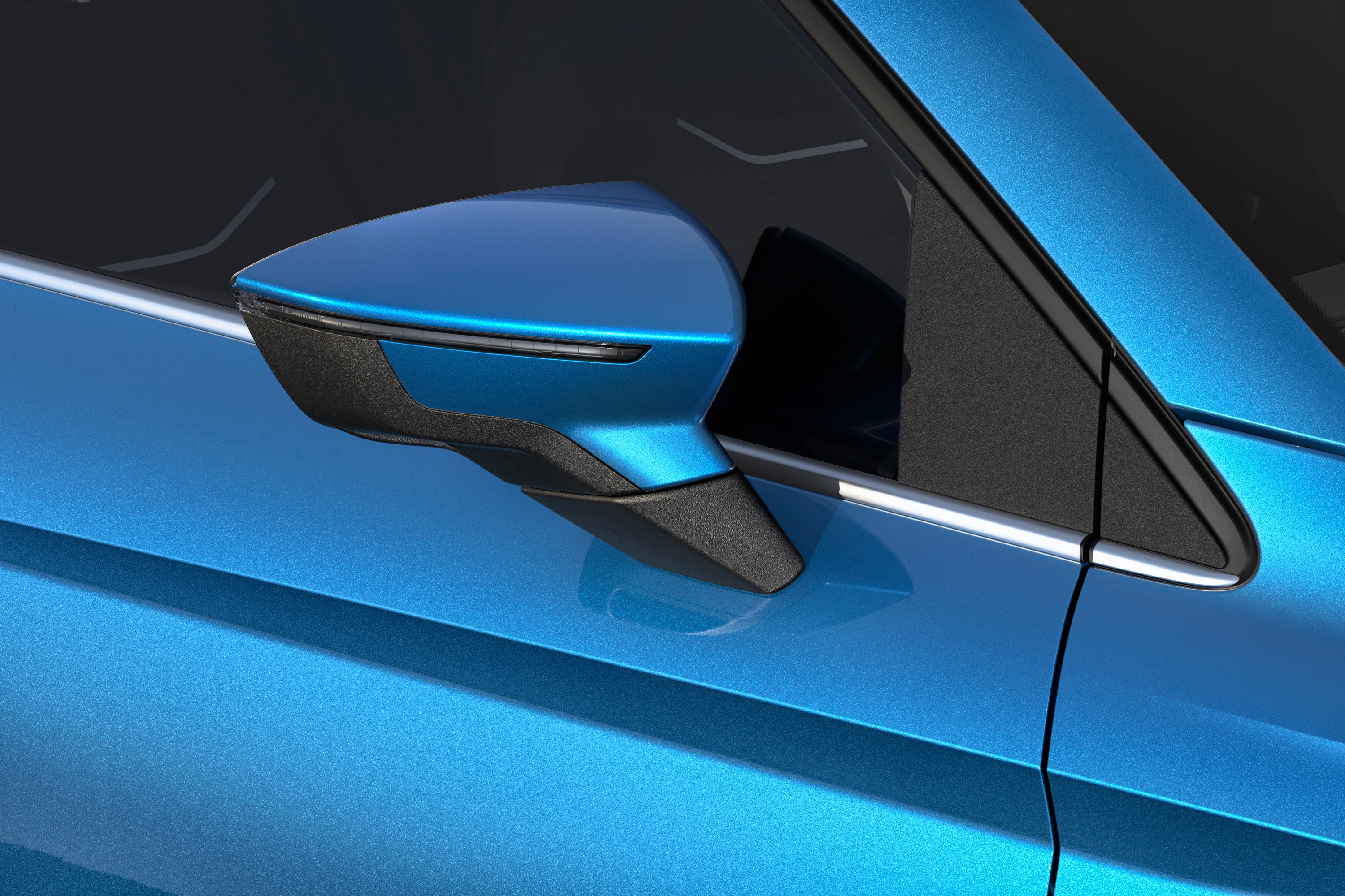 Seat leon with a sapphire blue metallic finish, close up. 